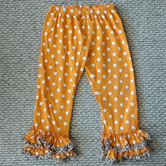 Girl's Orange White Polka Dot Ruffle Pants - Picture 1 of 3